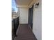A cozy balcony with dark metal railing and outdoor light fixture provides a relaxing outdoor space at 431 S Kalispell Way # 308, Aurora, CO 80017