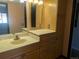 Bathroom featuring a sink, vanity, tile floor and a mirror at 431 S Kalispell Way # 308, Aurora, CO 80017