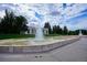 Picturesque view of a grand fountain and classical colonnade, set against a partly cloudy sky at 789 N Clarkson St # 906, Denver, CO 80218