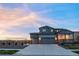 Charming two-story home with a two-car garage and inviting covered porch at 1845 Meagan Way, Erie, CO 80516