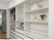 Organized walk-in closet with shelving and drawers at 1499 Blake St # 3M, Denver, CO 80202