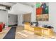 Welcoming lobby area with a reception desk, modern artwork, and comfortable seating at 1499 Blake St # 3M, Denver, CO 80202