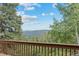 Stunning mountain views from the deck, creating a serene and picturesque backdrop at 32462 Lodgepole Dr, Evergreen, CO 80439