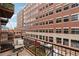 Cozy balcony with comfortable seating, a view, and an urban atmosphere at 1801 Wynkoop St # 208, Denver, CO 80202