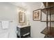 Bathroom featuring designer mirror, modern vanity, and ample lighting at 1801 Wynkoop St # 208, Denver, CO 80202