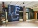 Welcoming entrance area featuring unique Ice-themed decor and signage, enhancing the building's character at 1801 Wynkoop St # 208, Denver, CO 80202