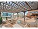 Inviting rooftop deck with a pergola, lounge furniture, and city views at 1801 Wynkoop St # 208, Denver, CO 80202