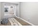 The room in the basement features carpet and a trendy rug, with a cozy seating cushion at 2663 King St, Denver, CO 80211