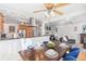 Open concept dining room with modern lighting and hardwood floors at 2663 King St, Denver, CO 80211