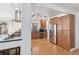 Spacious kitchen with stainless steel appliances, ample cabinetry, and hardwood floors at 2663 King St, Denver, CO 80211