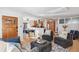 Inviting living room with hardwood floors flowing into the open kitchen area at 2663 King St, Denver, CO 80211