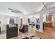 Spacious living room seamlessly connects to the dining and kitchen areas at 2663 King St, Denver, CO 80211