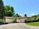 Charming single-story home with a well-manicured lawn and inviting curb appeal at 6040 W Elmhurst Dr, Littleton, CO 80128