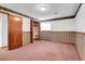 Finished basement featuring carpet flooring, wallpaper trim, and closet at 10142 Josephine St, Thornton, CO 80229