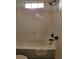 Clean and simple bathroom with a white tiled shower and updated fixtures at 2008 S Hannibal St # A, Aurora, CO 80013