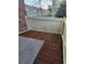 Private patio features a wooden deck and fenced surround, offering outdoor space at 2008 S Hannibal St # A, Aurora, CO 80013