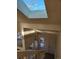 Bright stairwell featuring a skylight, staircase and modern lighting at 2008 S Hannibal St # A, Aurora, CO 80013