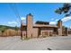 Two story home featuring a private entrance, chimney, and a spacious driveway for convenient parking at 30819 Hilltop Dr, Evergreen, CO 80439