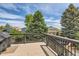 Outdoor deck overlooking the backyard at 5260 Morning Glory Pl, Highlands Ranch, CO 80130