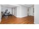 Finished basement with vinyl flooring featuring space for a home gym at 9673 Pinebrook St, Highlands Ranch, CO 80130