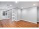Bedroom showcasing sliding closet doors with a neutral wall and vinyl flooring at 9673 Pinebrook St, Highlands Ranch, CO 80130