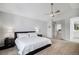 Bedroom boasts ceiling fan, and easy access to a bathroom and secondary office space at 9673 Pinebrook St, Highlands Ranch, CO 80130