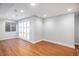 Comfortable bedroom area with ample space, vinyl flooring, and natural light at 9673 Pinebrook St, Highlands Ranch, CO 80130