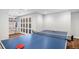 Spacious recreation room featuring a ping pong table and basketball net for Gathering fun at 9673 Pinebrook St, Highlands Ranch, CO 80130