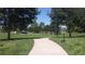 Scenic view of Timberline Park featuring a walking path, playground, and picnic area at 9673 Pinebrook St, Highlands Ranch, CO 80130