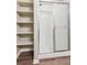 Modern bathroom featuring glass shower doors and built in shelves at 9692 W Coco Cir # 103, Littleton, CO 80128