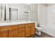 Bathroom featuring a double vanity, tile flooring, and a shower-tub combination at 9692 W Coco Cir # 103, Littleton, CO 80128
