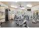 Spacious fitness center offering a variety of exercise equipment and ample natural light at 9692 W Coco Cir # 103, Littleton, CO 80128