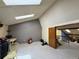 Bright bonus room with skylights, and stair access at 971 S Evanston Cir, Aurora, CO 80012