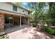 The backyard offers a covered patio perfect for outdoor dining and lounging at 9837 E Aberdeen Ave, Englewood, CO 80111