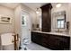 Luxurious bathroom featuring a double vanity, soaking tub, and elegant fixtures, creating a spa-like experience at 9837 E Aberdeen Ave, Englewood, CO 80111