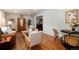 Inviting living room featuring hardwood floors, neutral paint and stylish furnishings at 9837 E Aberdeen Ave, Englewood, CO 80111