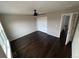 Bright bedroom featuring hardwood floors, neutral paint and window at 3231 Lump Gulch Way, Erie, CO 80516