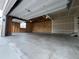 Two-car garage with window and neutral painted walls at 3231 Lump Gulch Way, Erie, CO 80516