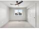 Cozy bedroom with natural light, closet, and neutral carpet flooring at 1571 Vrain St, Denver, CO 80204