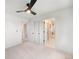 Carpeted bedroom features an ensuite bathroom and closet, offering comfort and convenience at 1571 Vrain St, Denver, CO 80204