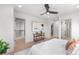 Spacious main bedroom boasts walk-in closet, light walls, and neutral decor at 1571 Vrain St, Denver, CO 80204