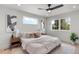 Inviting main bedroom featuring light walls, wood floors, and lots of natural light at 1571 Vrain St, Denver, CO 80204