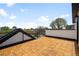 Spacious rooftop patio with sleek railings provides stunning views of the surrounding neighborhood at 1571 Vrain St, Denver, CO 80204