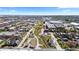 Expansive aerial shot showcasing the neighborhood with a greenway trail, modern buildings, and cityscape views at 3725 N Franklin St, Denver, CO 80205