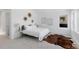 Modern bedroom with white walls, stylish decor, and lots of natural light streaming through the window at 3725 N Franklin St, Denver, CO 80205