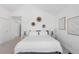 Spacious bedroom with a comfortable bed, stylish wall decor, and a bright and airy atmosphere at 3725 N Franklin St, Denver, CO 80205