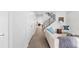 Hallway view leading to the main living area featuring hardwood floors and recessed lighting at 3725 N Franklin St, Denver, CO 80205