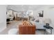 Open floor plan showcasing the kitchen and living room with modern furniture and decor throughout at 3725 N Franklin St, Denver, CO 80205