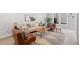 Comfortable living room featuring modern decor and a stylish area rug, with lots of natural light at 3725 N Franklin St, Denver, CO 80205