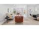 Inviting open-concept living area with modern decor, dining space, and ample natural light at 3725 N Franklin St, Denver, CO 80205
